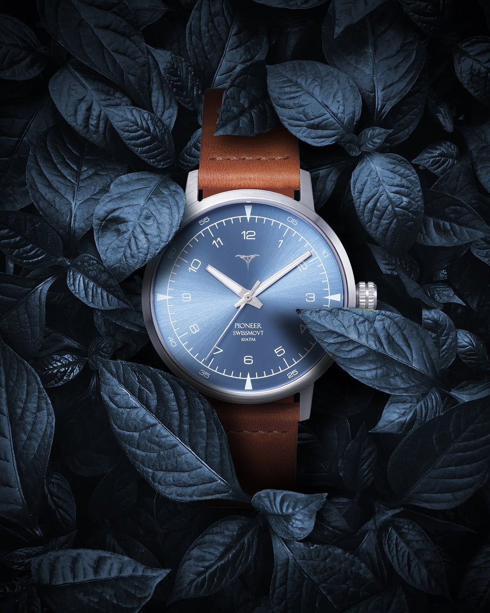 Minimalist blue watches on leaf | Vstelle Watch